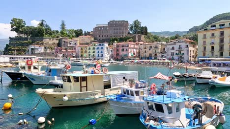 colorful boats and buildings in sorrento, italy