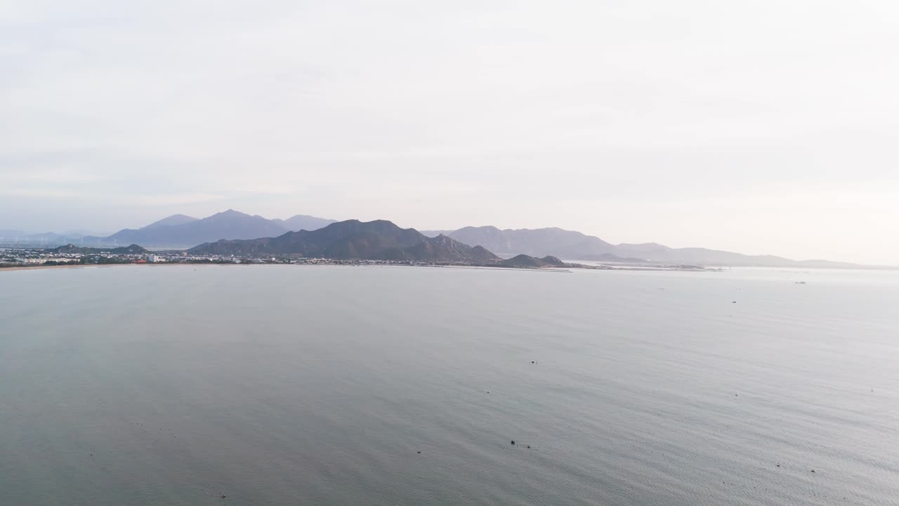 Aerial View Pan of the Coast and the Mountains in Phan Rang–Tháp Chàm in the Morning.