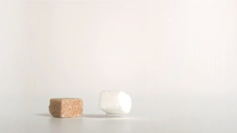 sugar cubes falling down in super slow motion