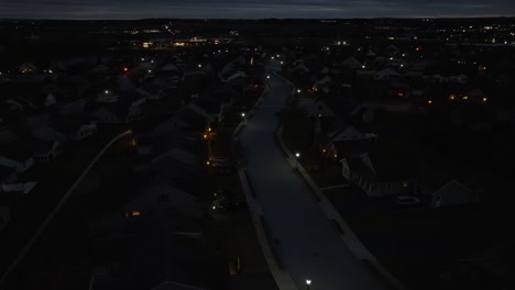 aerial orbit of new neighborhood in america at night