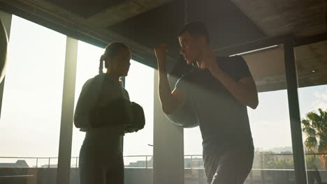 fitness, woman and boxer high five with personal