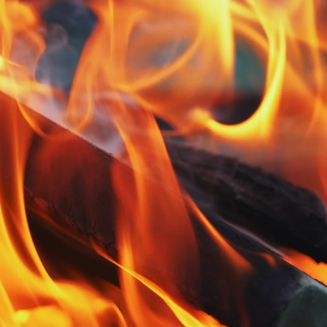 Fire is lit in the night. Bonfire. Slow motion