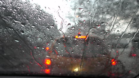 rain falling on car windshield view