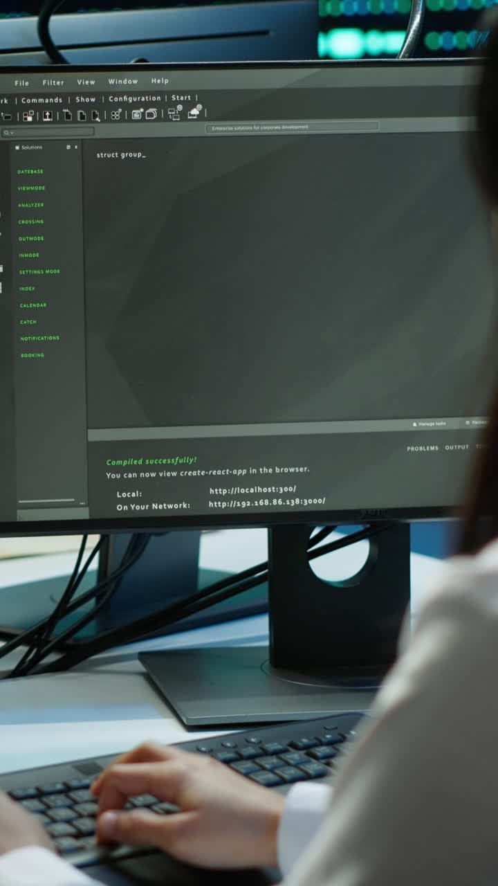 Close-up of Developer Typing Code on Computer Screen