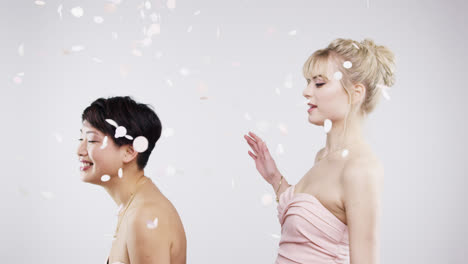 two young women bridesmaids dancing slow motion wedding photo booth series