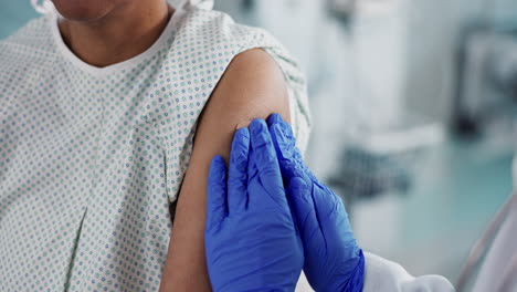 Doctor,-hands-and-bandage-on-arm