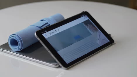 wrist cuff and tablet