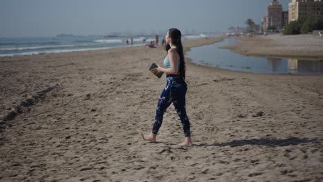 Woman Reading on Beach