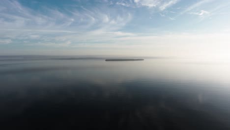 newfoundland coast with bell island on the back in calm early morning in the north atlantic ocean in canada