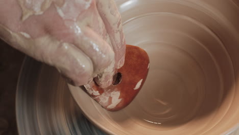 pottery making process on a wheel