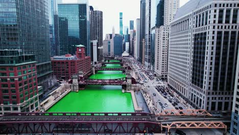 Lowering-aerial-between-buildings-downtown-during-the-St