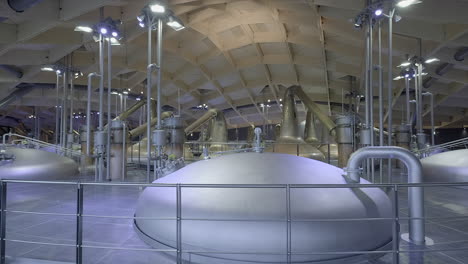 Interior-pipework,-copper-stills-and-mash-tuns-highlighting-the-architecture-and-complexity-of-a-modern-Scottish-whisky-distillery