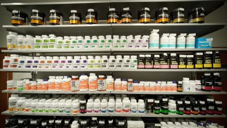 sport nutrition store interior with large choice of nutritional supplements.