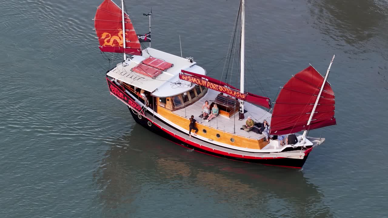 Tourists enjoy a boat ride in mangroves