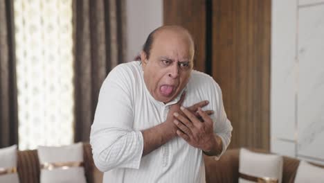 indian old man having heart attack