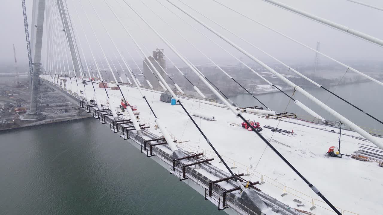 Large scale bridge construction megaproject in aerial view during winter