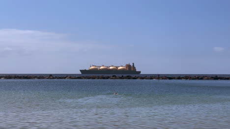 marine giant: gas tanker transports lng along tenerife’s shores