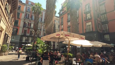 people enjoying a sunny day at a café