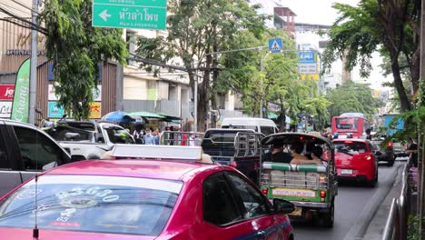 vehicles moving through congested city street