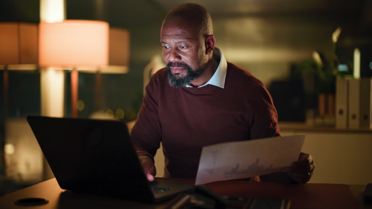 Man working on laptop at desk