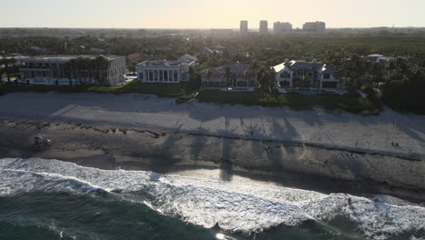 drone shot over ocean near sunset