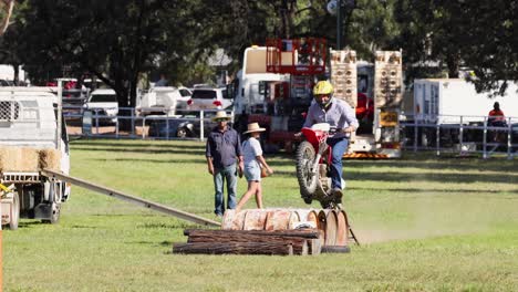 rider navigates obstacles on a dirt track