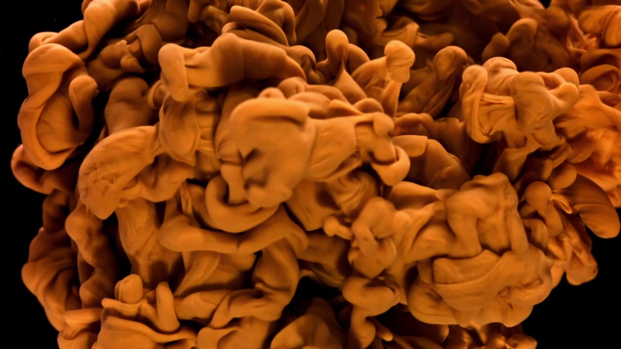 Abstract Orange Paint Cloud Dissolving in Dark Water