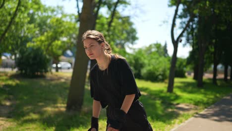 woman rollerblading in a park