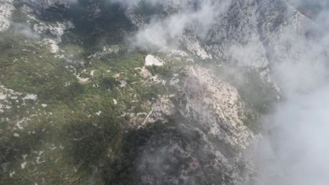 stunning cloudy mountains aerial drone shot of thermessos, antalya, turkey