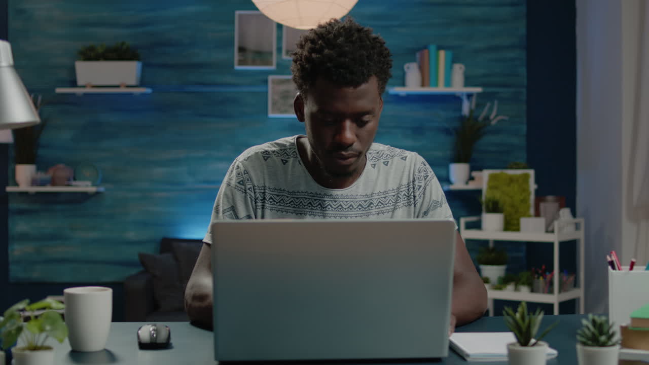 Freelance employee working from home on laptop