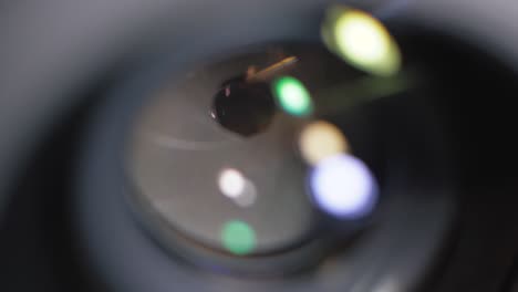 camera lens aperture close-up. aperture blades opening and closing during shooting