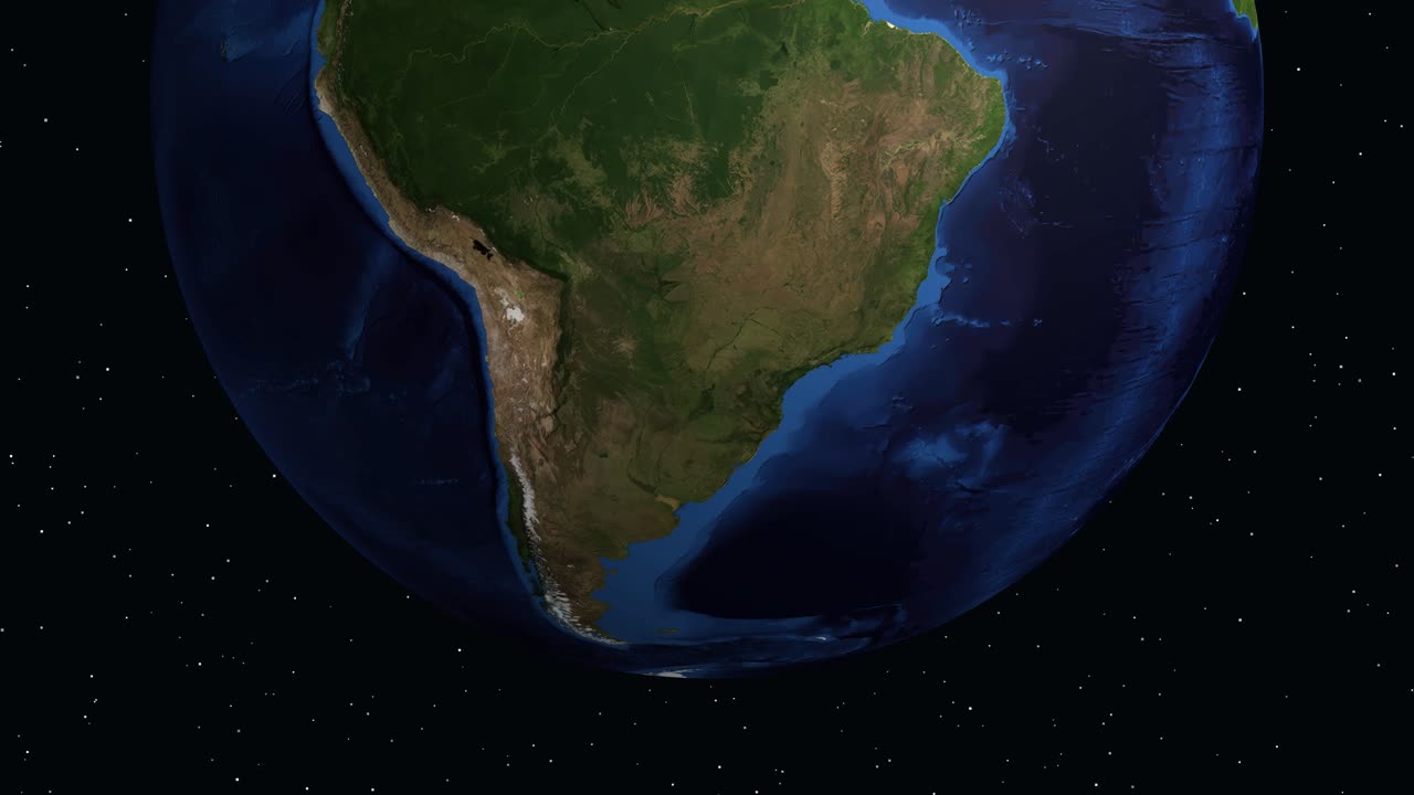 Il globo digitale ruota e zooma sul Sud America, evidenziando Santiago del Cile con testo informativo