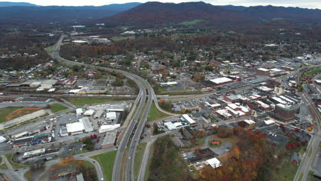 Aerial-View-of-Johnson-City,-Tennessee-USA,-Freeway-and-Road-Traffic,-Buildings-and-Cityscape-on-Autumn-Day,-Drone-Shot