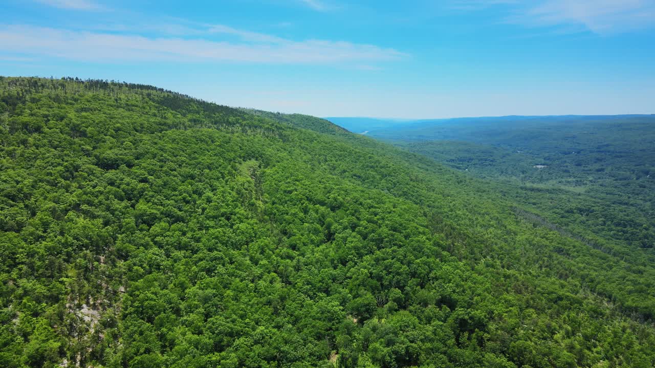 Aerial drone footage of Shawangunk Mountains during summer in New York’s Hudson Valley. The Shawangunks are a sub-range of the Appalachian Mountains on the east coast of United States