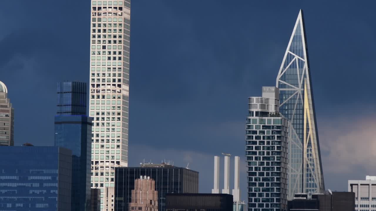 Skyscrapers glass buildings NYC close up moving shot 4K