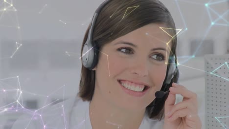 Animation-of-data-processing-over-businesswoman-using-phone-headsets