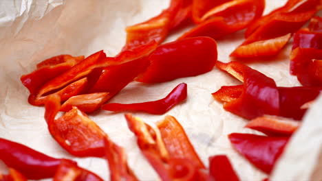 red peppers and scallions placed in baking tray