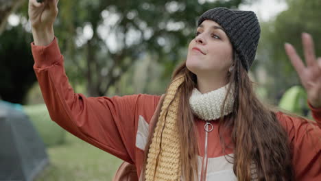 Selfie,-camping-and-woman-in-forest