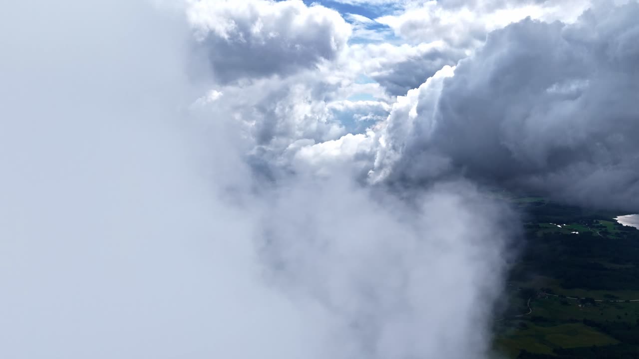 Cumulus clouds skyline high altitude aerial drone above nature forest rural landscape