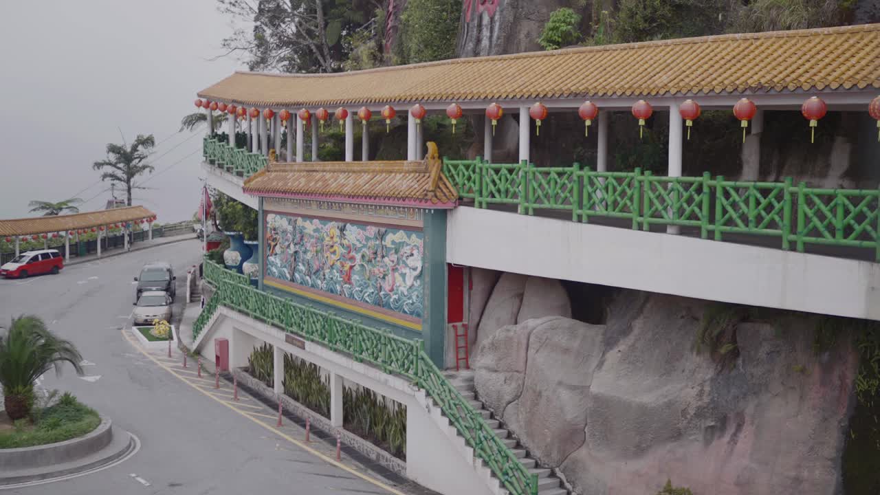 Outdoor shot of Chin Swee Caves Temple with ropeways operating for tourists in Malaysia.