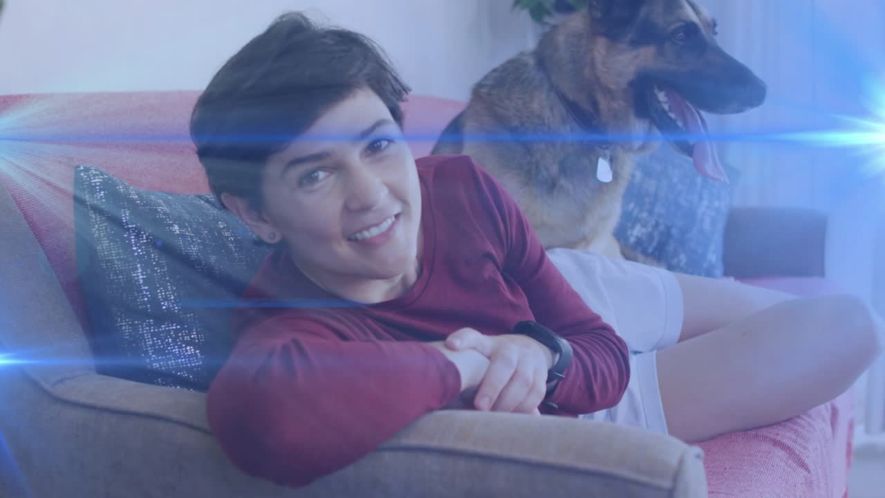 Woman turning to cam after dog shifting panting smiling bonding in home with lens flare crossing