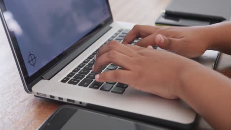 Close-up-of-african-american-plus-size-woman-using-laptop-with-copy-space,-slow-motion