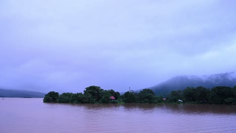 flooded lake scenery with houses and temples underwater at wangnamkaew, nakhon ratchasima, thailand