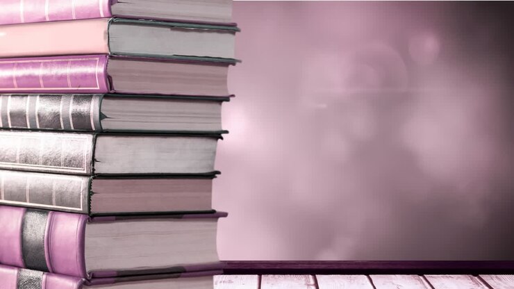 Animazione di pila di libri con spazio per il testo su luci rosa brillanti.
