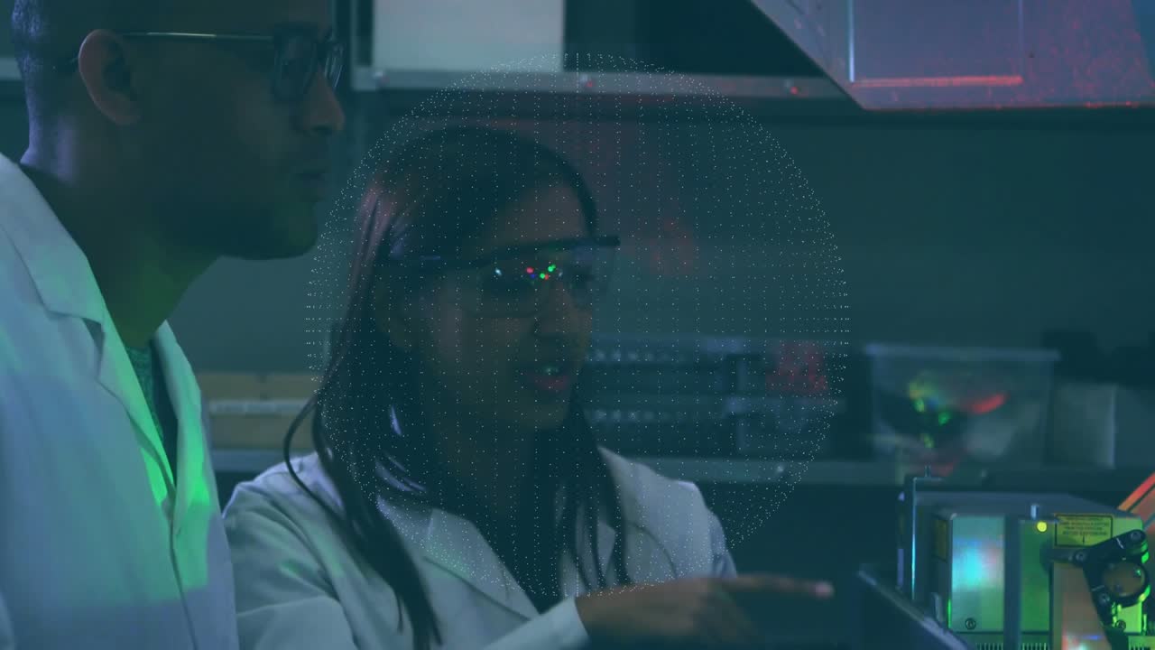 Woman tapping tablet rotating holo globe tagging nodes as man points examining network optics lab