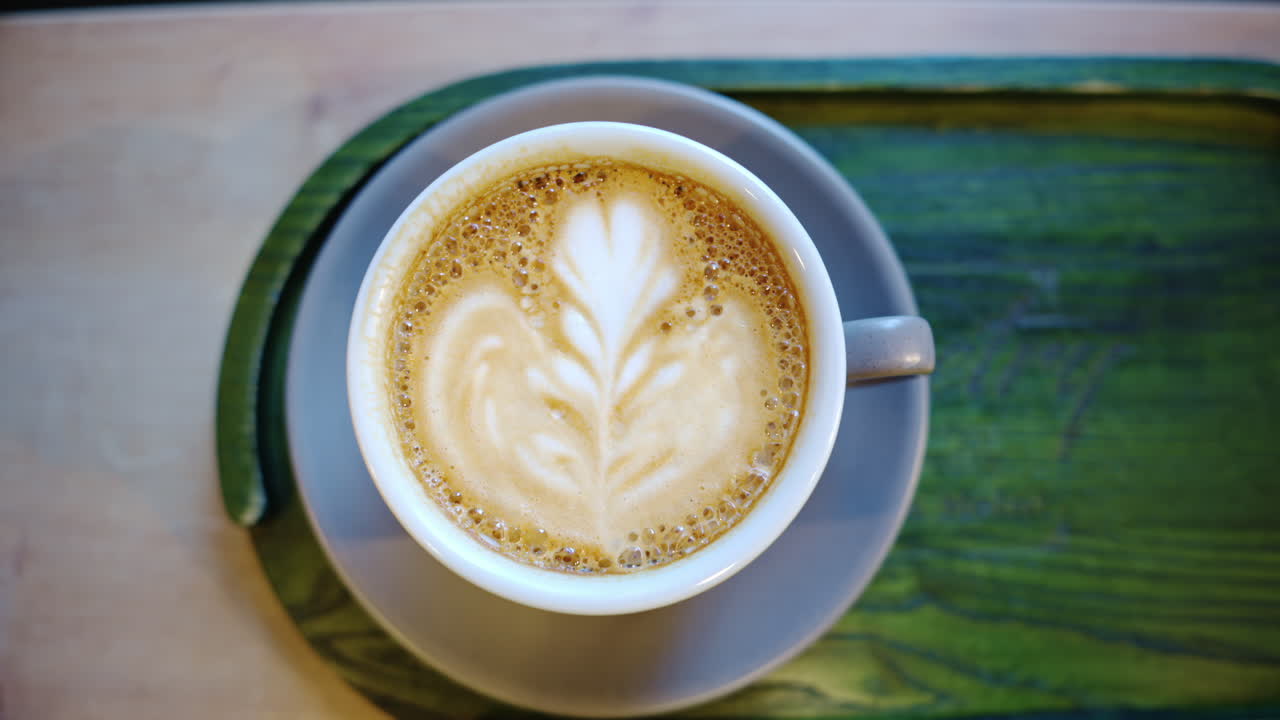 Top down shot of foam latte art on coffee