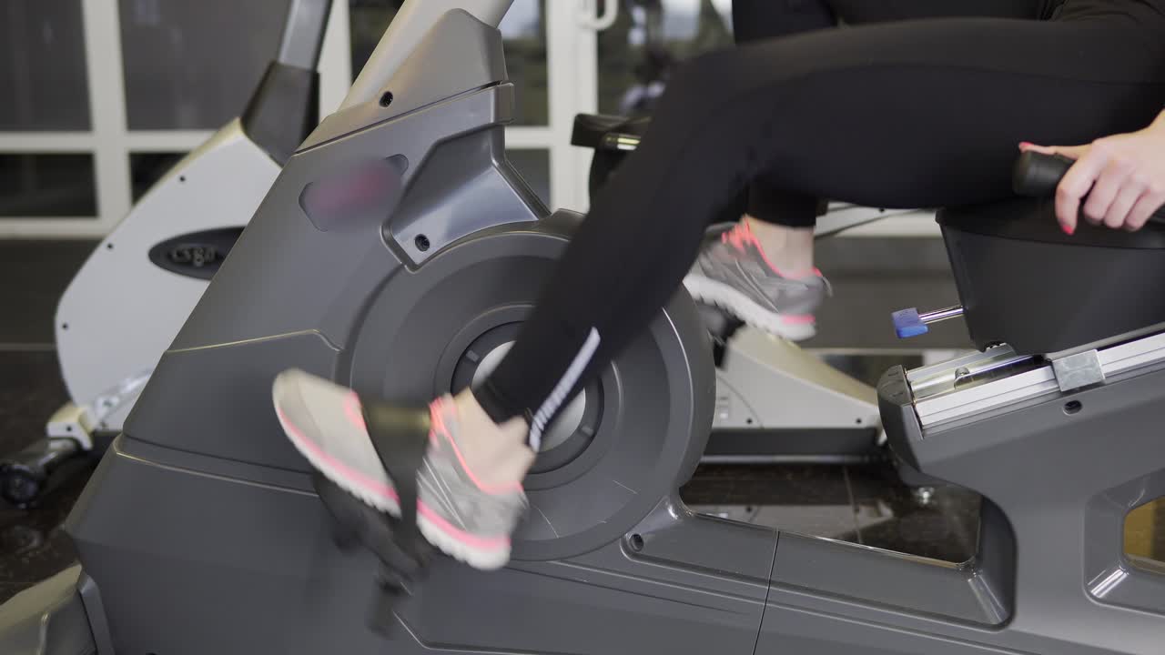 Woman Working Out on a Stationary Bike