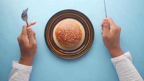 burger on a plate ready to be eaten