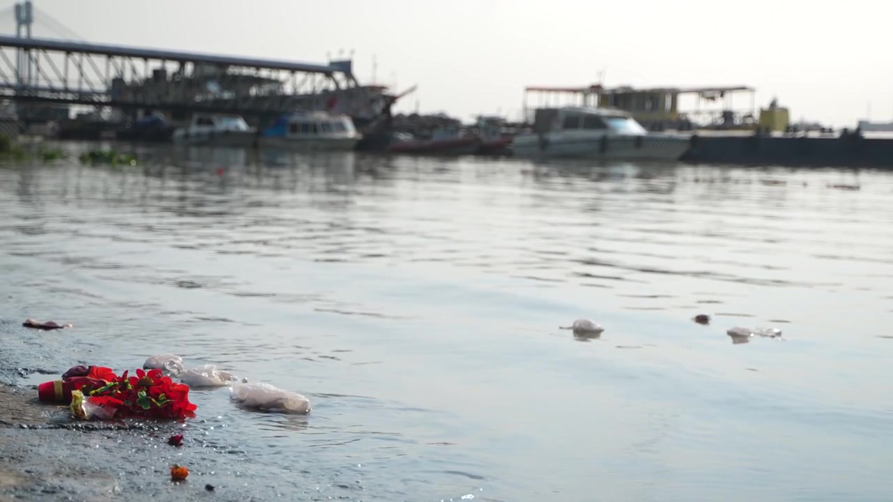 The water of the Ganges River is being polluted due to the dumping of waste.