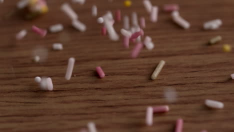 colourful sprinkles pouring onto surface